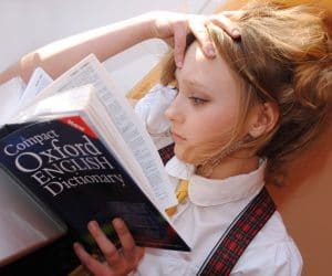 Canva Girl Reading Dictionary 300x250